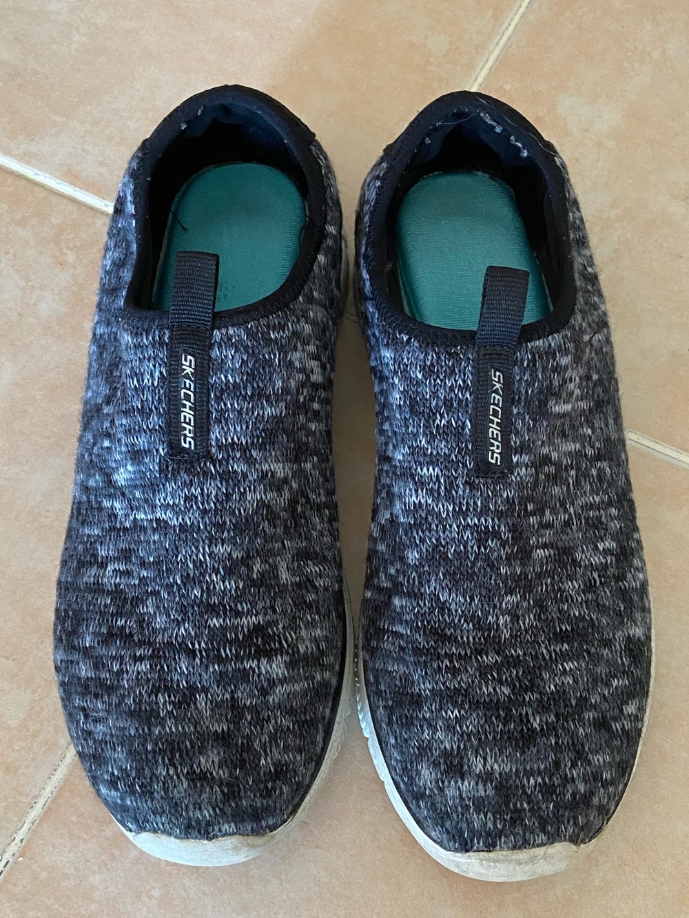 Skechers soft top shoes.